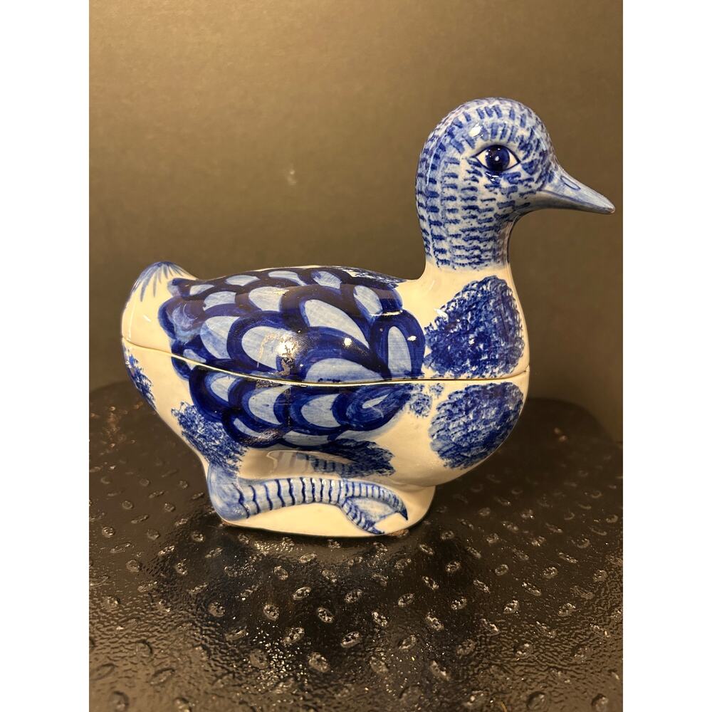 vintage Nora Fenton ceramic duck trinket box with blue and white design.
